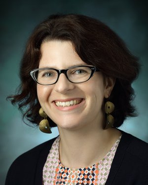 Dr. Cooke Promoted to Associate Professor